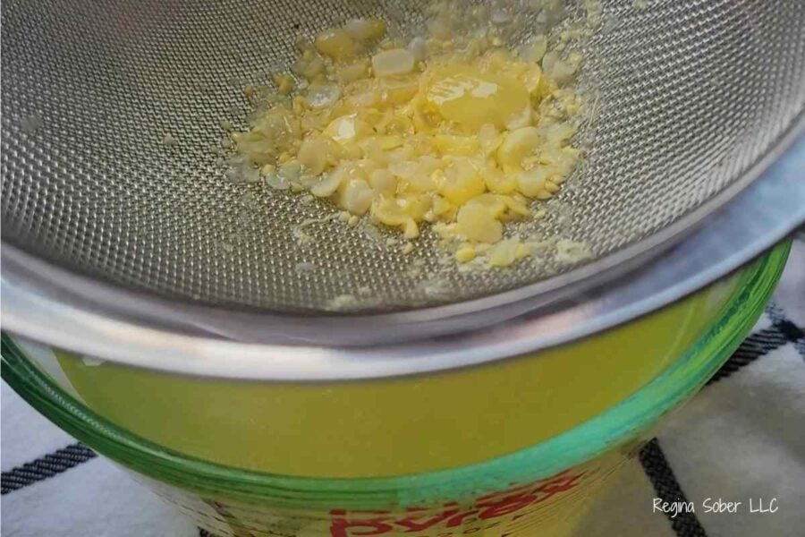 straining corn cob water