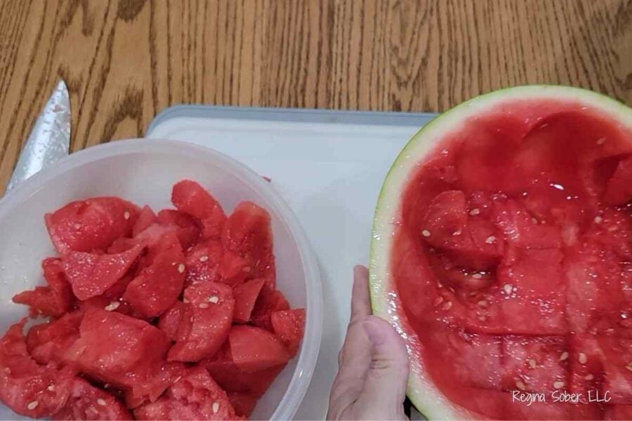 cutting watermelon into cubes