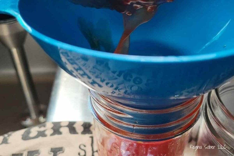 filling jelly jar