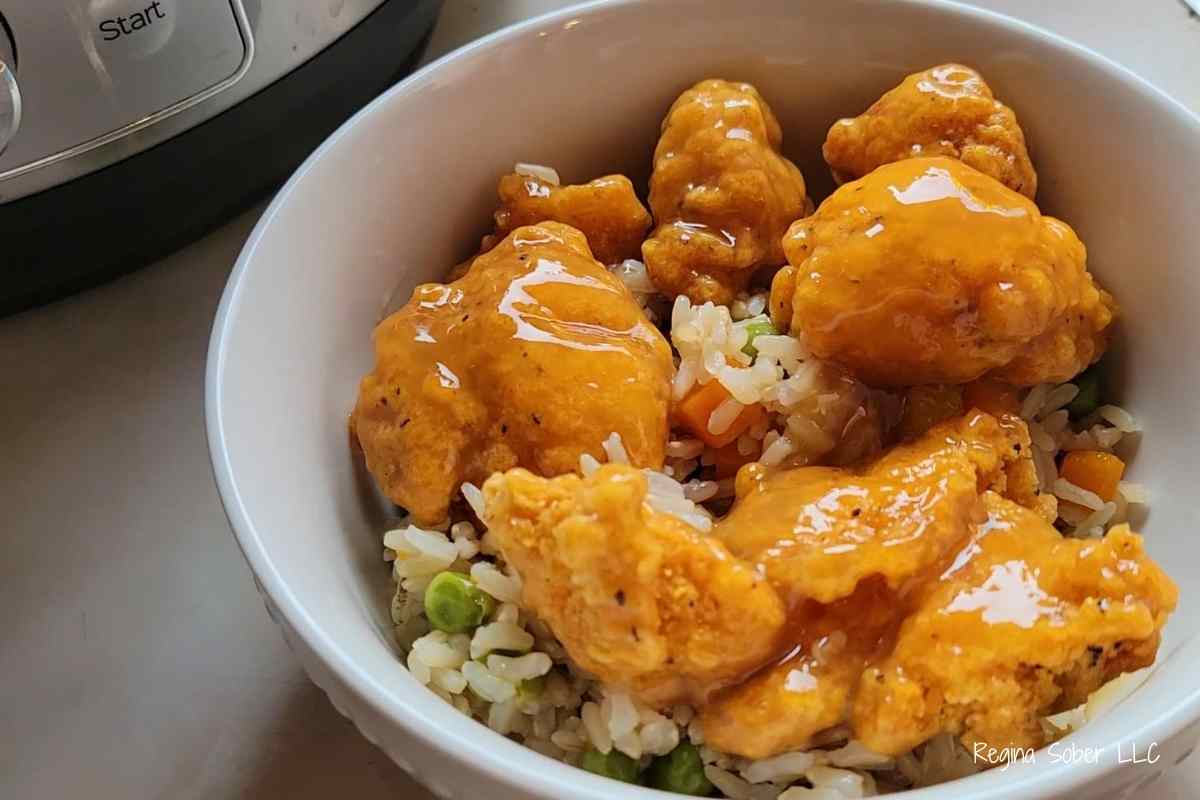 bowl of orange chicken and rice