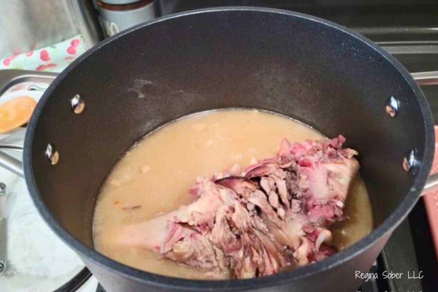 ham bone leftover in chicken stock on medium high heat