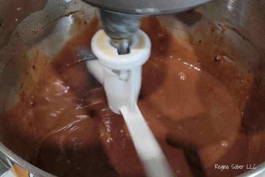 chocolate espresso cake batter mixing in a stand mixer