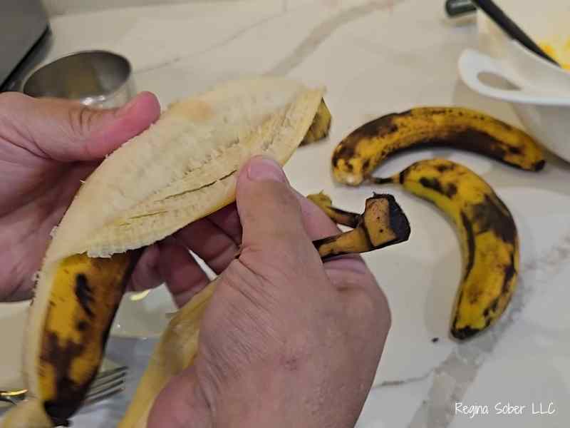 peeling ripe bananas for banana bread