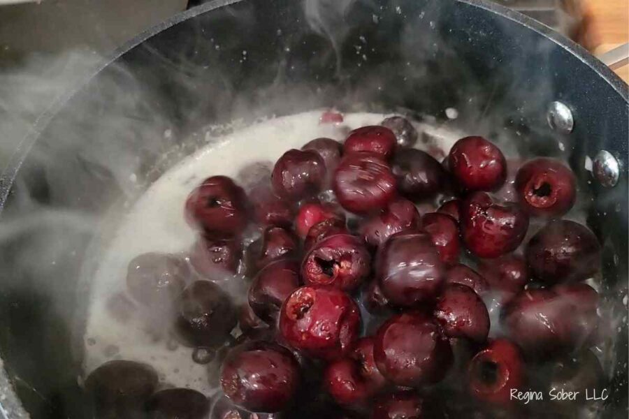 whole cherries in boiling granulated sugar water