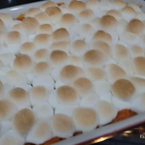 golden brown baked sweet potatoes with toasted marshmallows