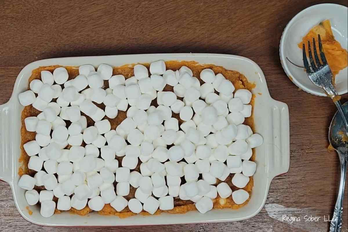 mini marshmallows in baking dish with sweet potato casserole