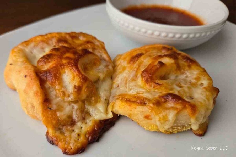 baked pizza rolls with pizza sauce