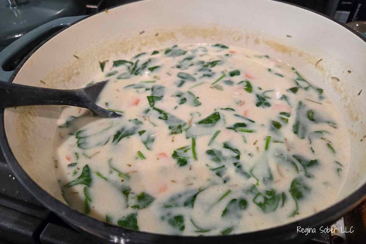 spinach in pot of soup