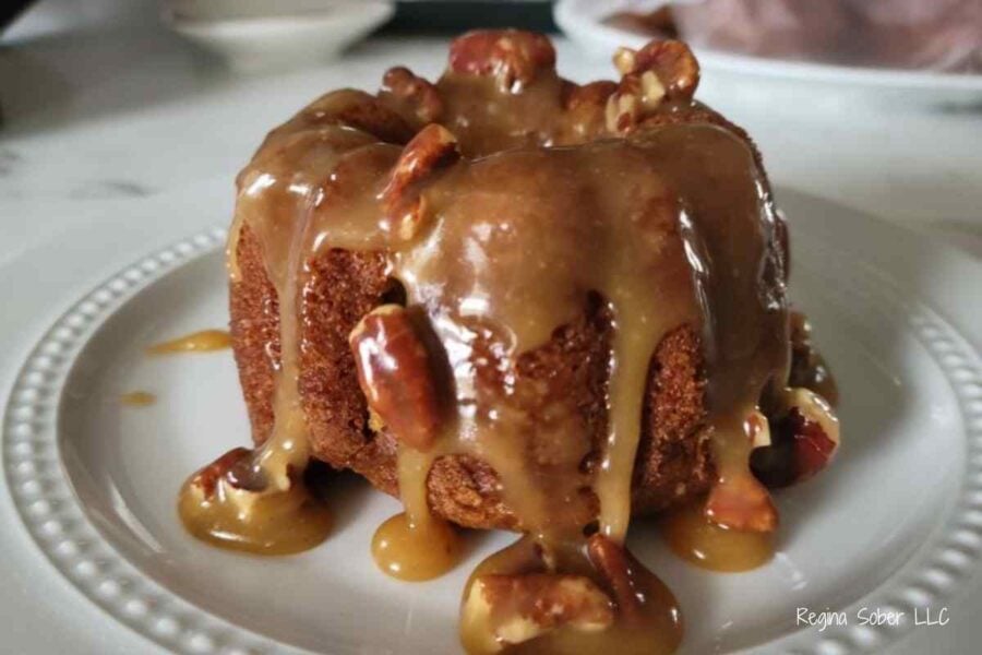 plated pumpkin bundt cake wtih pecan caramel sauce