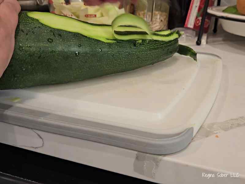 peeling huge zucchini