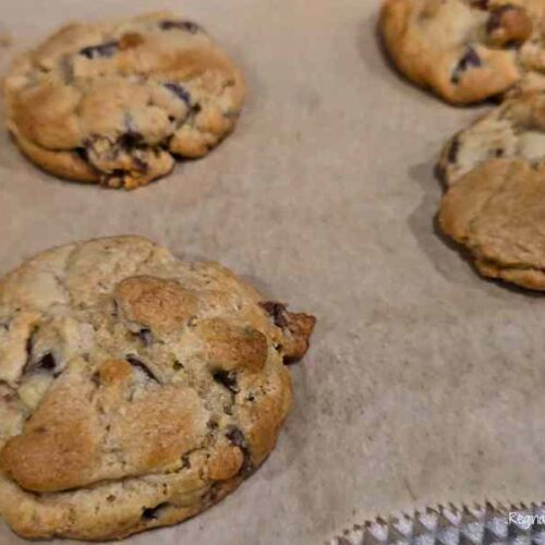 baked chocolate chip cookies on cookie sheet