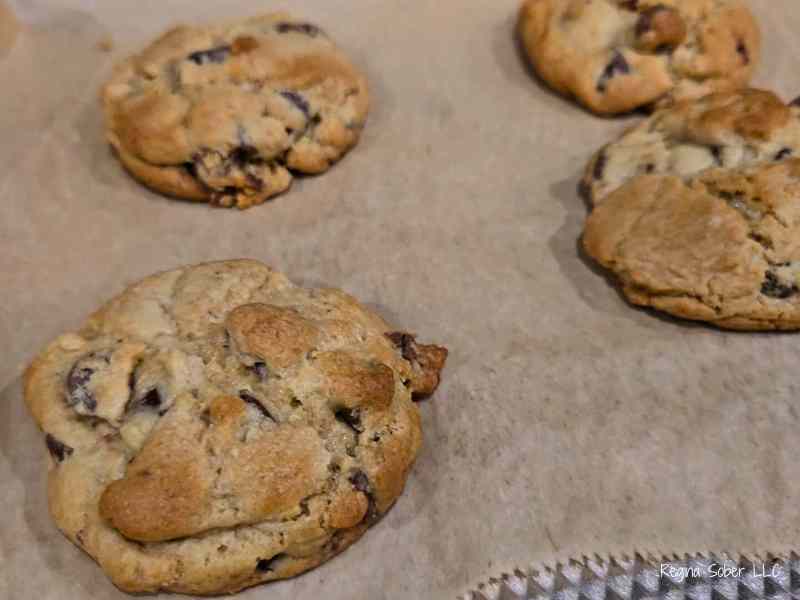 baked chocolate chip cookies on cookie sheet