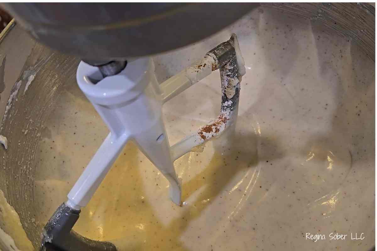 large mixing bowl: sour cream, vegetable shortening, sugar, nutmeg, baking soda, baking powder in stand mixer