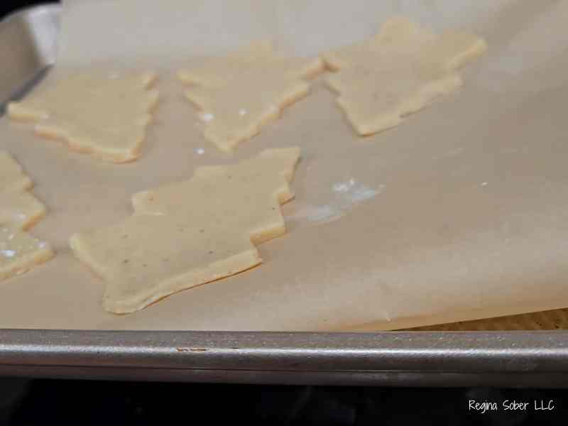 cut out cookies on baking sheet