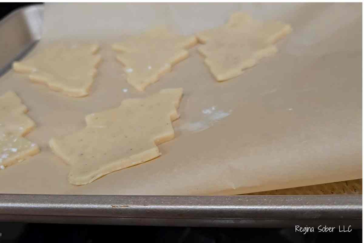 cut out cookies on baking sheet