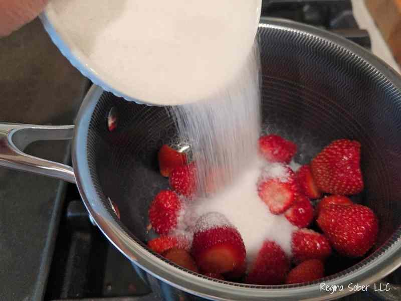 add just enough sugar to sweeten the strawberries. It varies by your berries